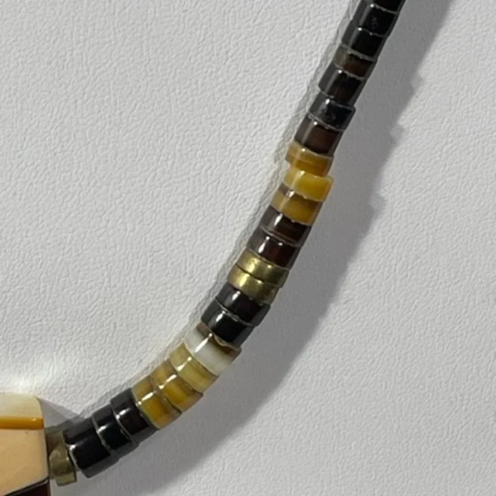 Vintage stone and inlay heishi necklace. Shell, onyx and jasper.